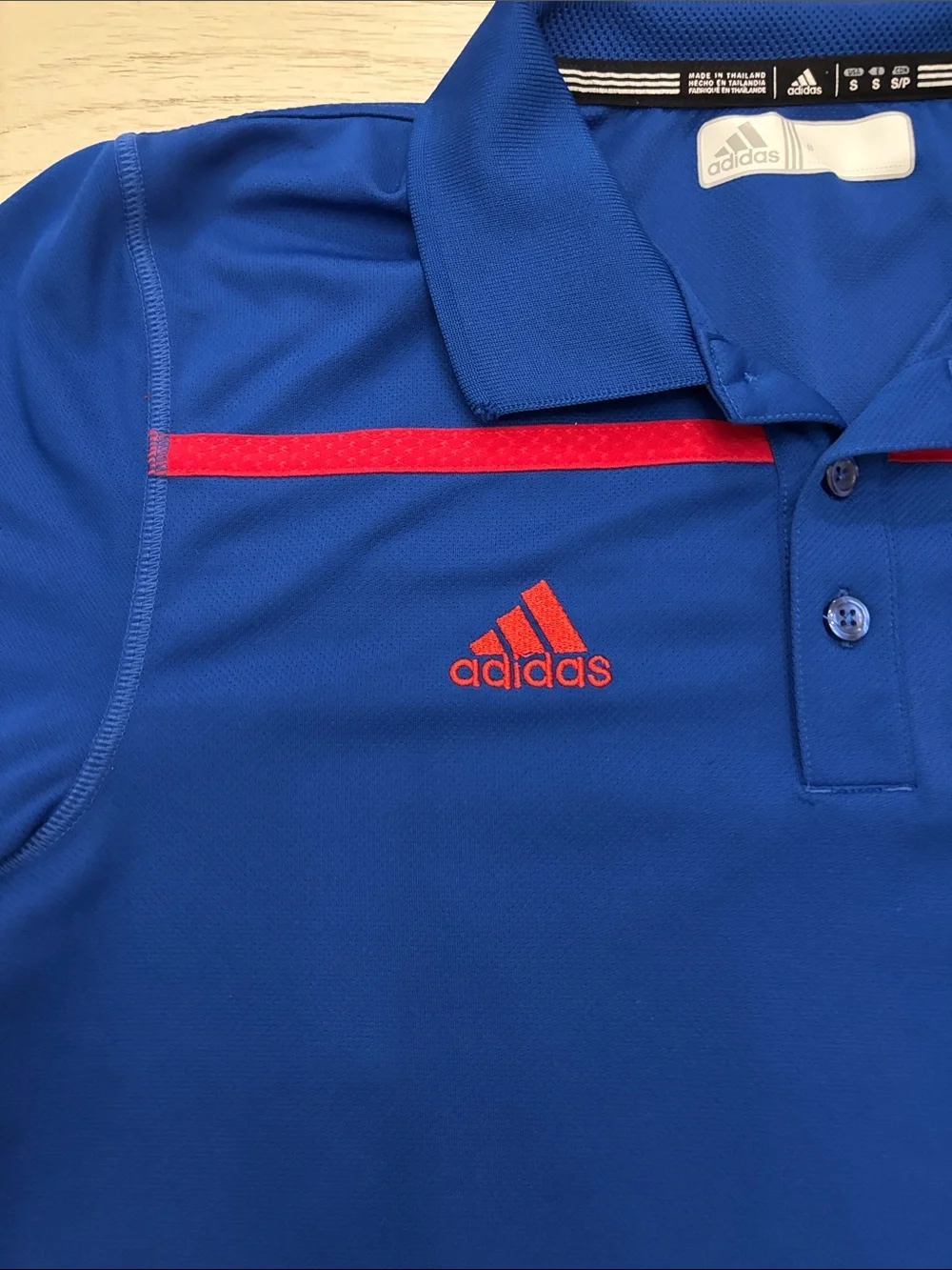 Adidas Kansas Jayhawks (KU) performance polo shirt in men’s size Small.